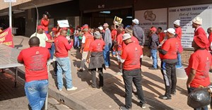 About 50 members of the Food and Allied Workers Union picketed outside the Labour Court on Tuesday. They had applied to interdict South African Breweries (SAB) from retrenching workers. Photo: Silver Sibiya / GroundUp