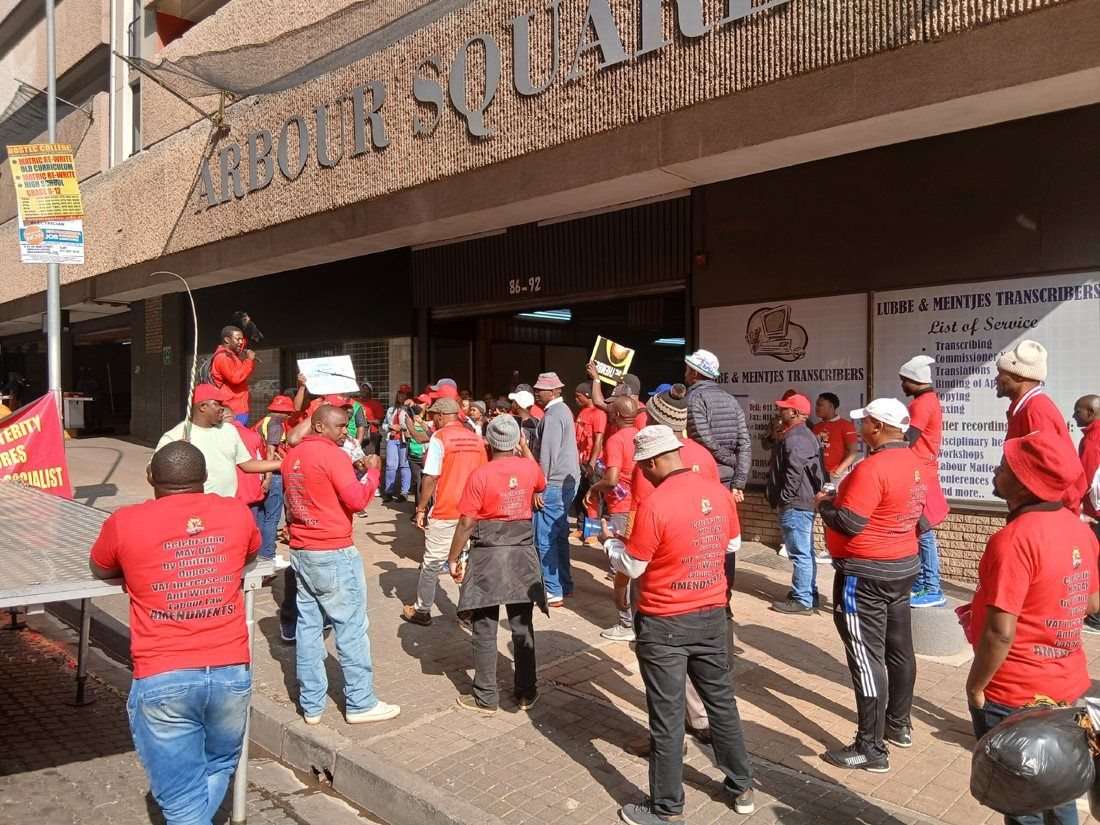 About 50 members of the Food and Allied Workers Union picketed outside the Labour Court on Tuesday. They had applied to interdict South African Breweries (SAB) from retrenching workers. Photo: Silver Sibiya / GroundUp