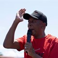 Julius Malema, the leader of the Economic Freedom Fighters (EFF), addresses supporters as he leads a protest towards the Constitutional Court, where the political party is challenging the National Assembly’s rejection of a report that could have led to impeachment proceedings against President Cyril Ramaphosa due to the Phala Phala scandal at his private game farm in Johannesburg, South Africa, 26 November 2024. Reuters/Ihsaan Haffejee