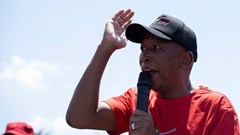 Julius Malema, the leader of the Economic Freedom Fighters (EFF), addresses supporters as he leads a protest towards the Constitutional Court, where the political party is challenging the National Assembly’s rejection of a report that could have led to impeachment proceedings against President Cyril Ramaphosa due to the Phala Phala scandal at his private game farm in Johannesburg, South Africa, 26 November 2024. Reuters/Ihsaan Haffejee