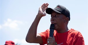 Julius Malema, the leader of the Economic Freedom Fighters (EFF), addresses supporters as he leads a protest towards the Constitutional Court, where the political party is challenging the National Assembly’s rejection of a report that could have led to impeachment proceedings against President Cyril Ramaphosa due to the Phala Phala scandal at his private game farm in Johannesburg, South Africa, 26 November 2024. Reuters/Ihsaan Haffejee