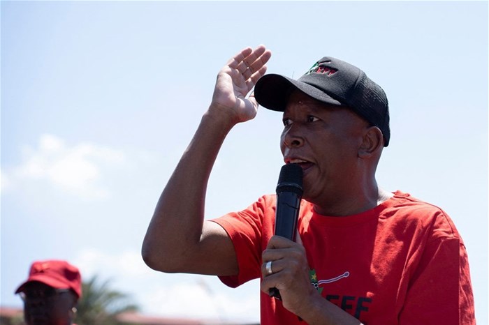 Julius Malema, the leader of the Economic Freedom Fighters (EFF), addresses supporters as he leads a protest towards the Constitutional Court, where the political party is challenging the National Assembly’s rejection of a report that could have led to impeachment proceedings against President Cyril Ramaphosa due to the Phala Phala scandal at his private game farm in Johannesburg, South Africa, 26 November 2024. Reuters/Ihsaan Haffejee