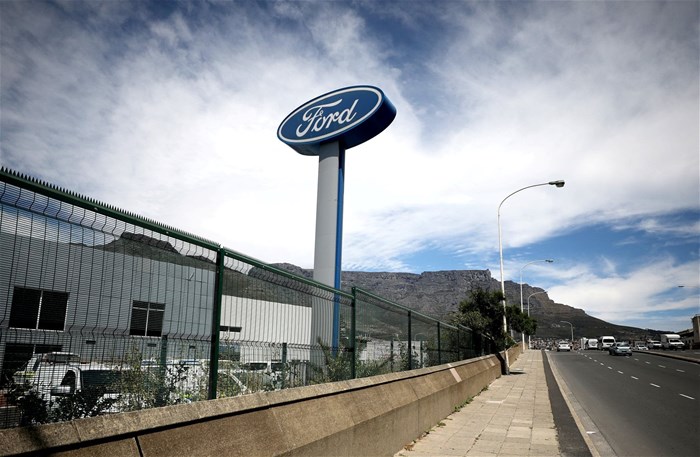 File photo: The logo of the Ford Motor Company is seen outside a car dealership in Cape Town, South Africa, on 18 October 2017. Reuters/Mike Hutchings/File Photo