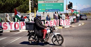 Dozens of people, many of them health workers, picketed outside Red Cross Hospital on Thursday. Photos: Matthew Hirsch