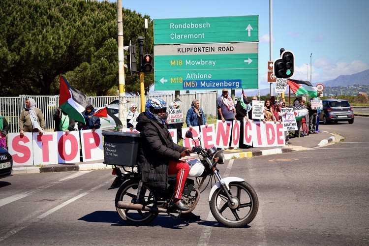 Dozens of people, many of them health workers, picketed outside Red Cross Hospital on Thursday. Photos: Matthew Hirsch