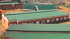 The new campus for Rivoni School of the Blind includes several large buildings. But work to finish the project has been stalled for most of this year. Photos: Thembi Siaga / GroundUp