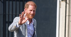Britain's Prince Harry waves as he departs after his visit to the Community Recording Studio (CRS), a grassroots institution providing opportunities for young people, in Nottingham, Britain, 9 September 2025. Image credit: Reuters/Phil Noble