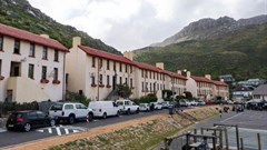 These blocks of flats in Kalk Bay, built in the 1940s, have been inhabited by generations of fishing families. The families are concerned that high water bills are threatening their ability to keep living here. Photos: Liezl Human