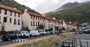 These blocks of flats in Kalk Bay, built in the 1940s, have been inhabited by generations of fishing families. The families are concerned that high water bills are threatening their ability to keep living here. Photos: Liezl Human