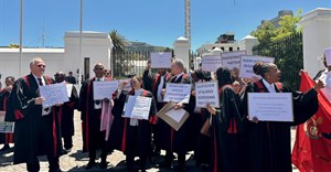 About 30 magistrates protested outside Parliament at lunch time on Wednesday afternoon. Photo: Zora Hollie / GroundUp