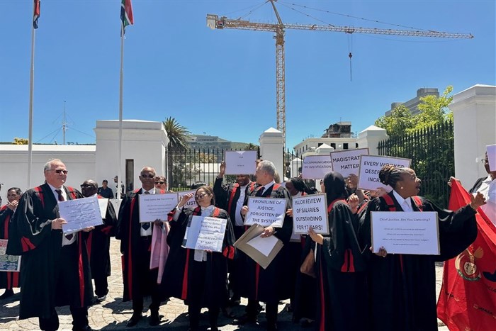 About 30 magistrates protested outside Parliament at lunch time on Wednesday afternoon. Photo: Zora Hollie / GroundUp