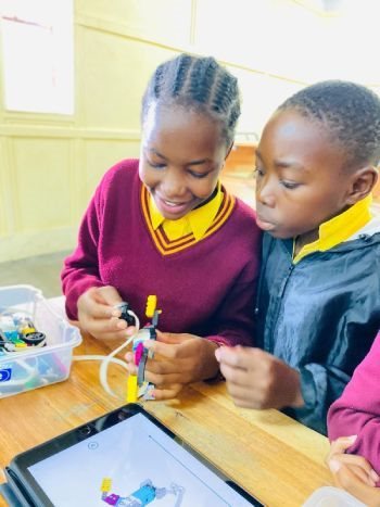Source: Good Work Foundation | Schoolchildren attending supplementary classes at Good Work Foundation’s digital learning campuses learn how to make and code Lego Spike robots using technology.