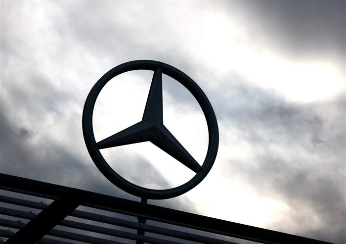 A logo of the Mercedes-Benz is seen outside a Mercedes-Benz car dealer in Brussels, Belgium, on 13 March 2023. Reuters/Yves Herman/File Photo