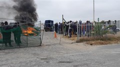 Workers protested outside this project site in Illitha Park, Khayelitsha, since Monday over their unpaid wages. Photo: Vincent Lali / GroundUp