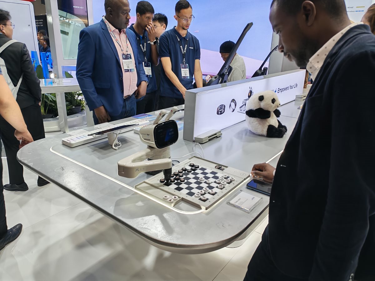 An interesting chess-playing robot displayed at the Honor stand