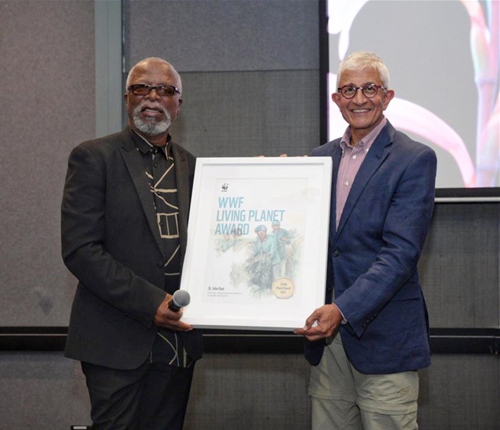 Dr John Kani, with WWF board chair Valli Moosa, receiving the Living Planet Award. Image supplied.