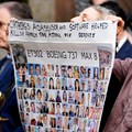 People hold a banner with pictures of victims of crashed Ethiopian Airlines flight 302 Boeing 737 Max 8 during Senate Commerce, Science, and Transportation Committee hearing about Boeing’s commitment to address safety concerns in the wake of a January 2024 mid-air emergency involving a new 737 Max, on Capitol Hill in Washington, DC, US, 2 April 2025. Reuters/Ken Cedeno/File Photo