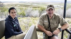 Source: John Yeld. Nuwejaars Wetlands Special Management Area conservation manager Erica Brink and operations manager Ross Kettles. In the background is part of the wetlands where hippos were reintroduced after being shot out more than 150 years ago.