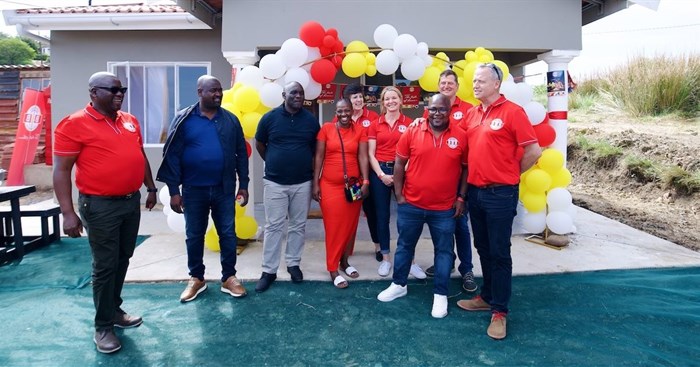 At the ribbon-cutting ceremony held at House Nhleko, left to right: Samukelo Nkosi, regional community development specialist, Premier FMCG | Councillor Sfiso Mkhize, deputy chairperson of the Human Settlements and Infrastructure Committee in the eThekwini Municipality | Siphiwe Mthembi, iNduna of Danganya, Thembelihle Hleko, house Beneficiary | Elmare Pieterse, site manager at Premier Foods | Stephanie Hoy, marketing executive Premier FMCG | Collin Mkhize, sales executive Premier FMCG | Jacques Minnar | Danie Simpson, Bakery managing executive at Premier FMCG