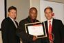 James Shikwambana (Radio Sports Journalist of the Year) with SAB's Tony van Kralingen and Michael Farr