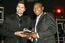 Andy Ellis and Fulton Ramaphakela accepting his award.