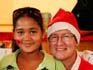Shade Arnolds (patient) with Father Christmas, Darryl Lloyd at the annual CHOC Childhood Cancer Foundation Christmas in June celebration which was supported by the Danone Clover &quot;Caring for Our Children&quot; campaign and Ultramel.