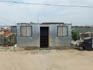 The tiny temporary shack where Sibongile, her monther Thabitha and her son live