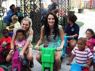 Leandi du Randt from Getroud Met Rugby on the bike with one of the children and Donnalee Roberts on the motorbike enjoying a moment with some of the others.