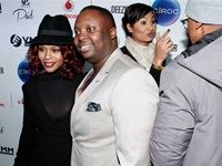 The gorgeous Nomzamo Mbatha smile for the camera with DJ Sphe