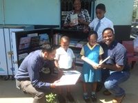 Novus management and the Principal at the handover function