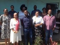 Proud Educators and Governing Body members seen at the handover of the Libraries.