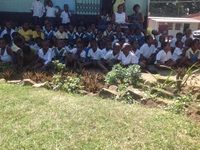 Excited learners break out into a song at the handover function!