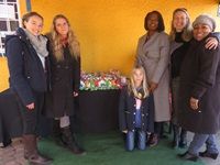 GBCSA staff gather around the cake table