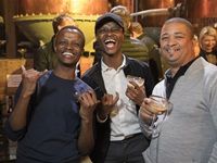 Guests enjoying brandy based cocktails-min